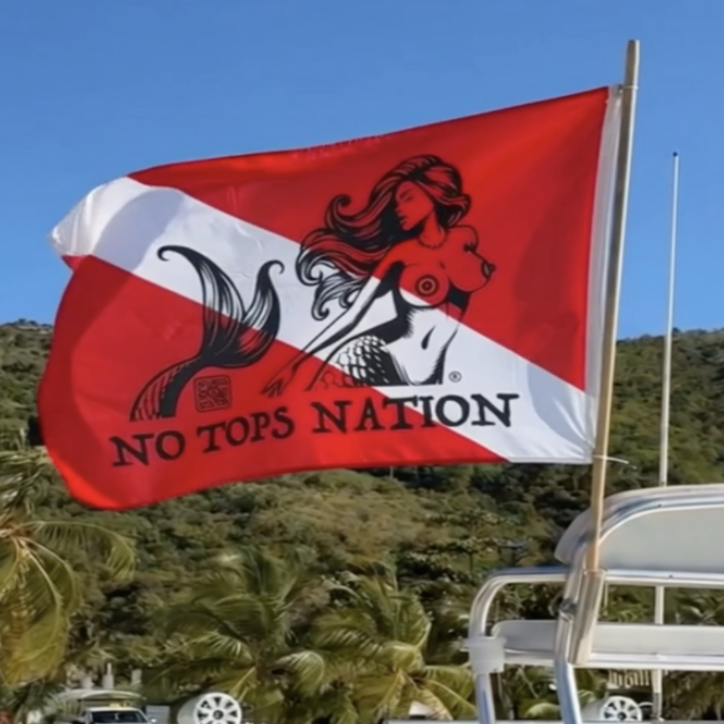 No Tops Nation double-sided marine dive flag displayed on a boat while explaining dive flag laws and boating safety for divers.